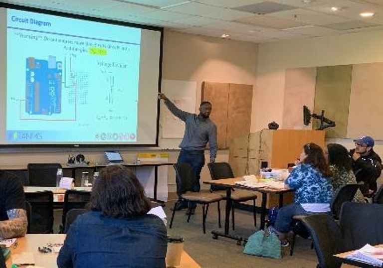 Figure 1: TANMS Graduate Fellows introduce an Arduino Electromagnetic Nanomotor activity, included in the MESA Course to Institute