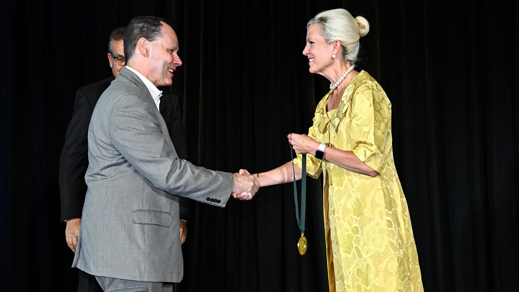  Dr. Gerard Coté receiving award